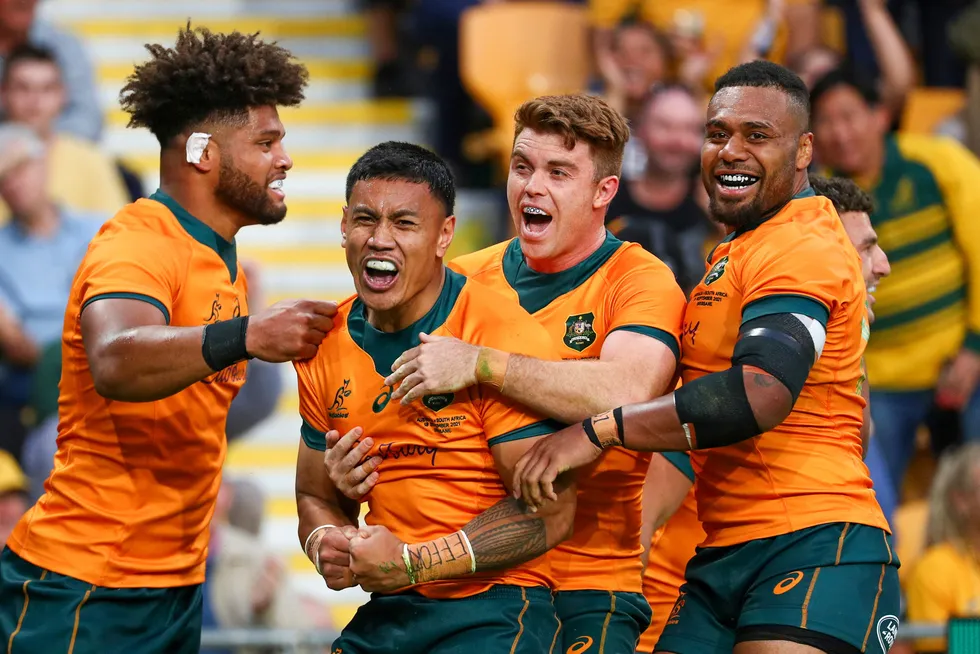 Beauty mate: Australian rugby players celebrate during their victory over South Africa last weekend