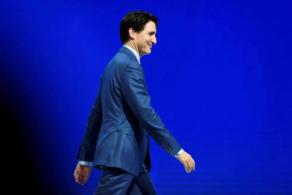 Den kanadiske statsministeren Justin Trudeau var sentral forhandlingene om en ny handelsavtale. Her forlater han scenen etter et innlegg på World Economic Forum i Davos mandag. Foto: Fabrice Coffrini/AFP/NTB Scanpix