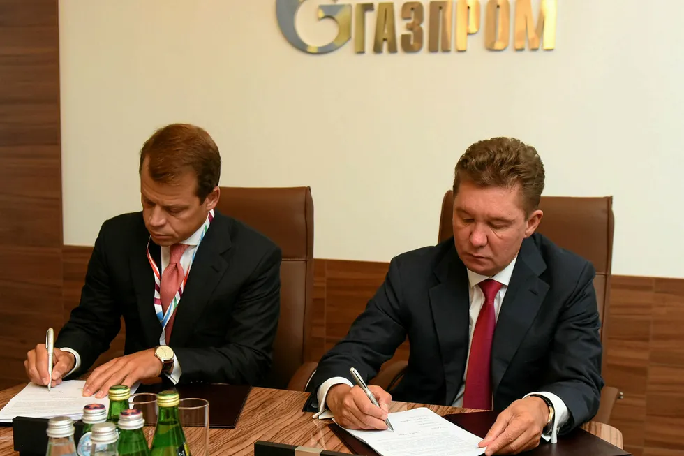 Co-operation: Rusgazdobycha executive director Artyom Obolensky (left) and Gazprom executive board chairman Alexei Miller sign a joint venture agreement in St Petersburg