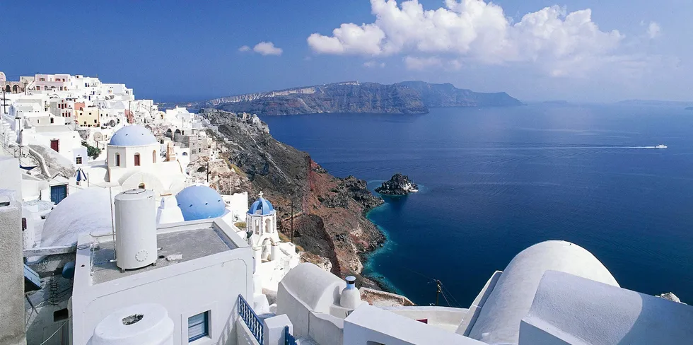 Sea behind village of Oia on the island of Santorini, Greece