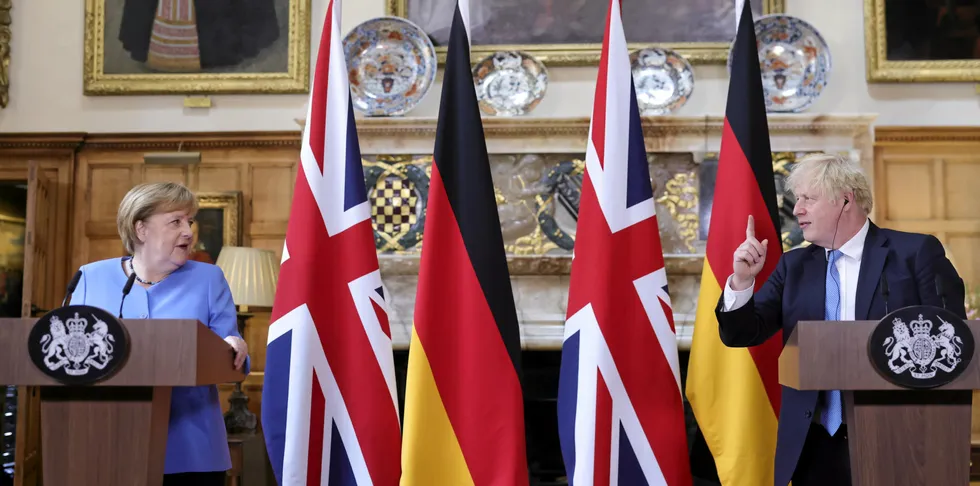 Prime Minister Boris Johnson (R) and the Chancellor of Germany Angela Merkel (L) hold a joint press conference at Prime Ministers country residence Chequers in Aylesbury, United Kingdom on July 02, 2021. . Johnson Merkel.