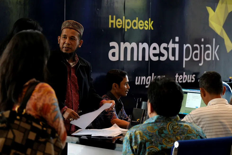 Et skatteamnestiprogram i Indonesia er blitt en stor suksess. Foto: BEAWIHARTA/Reuters/NTB scanpix