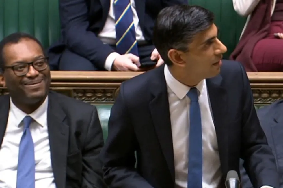 Debate: UK Business Secretary Kwasi Kwarteng (left) reacts as Chancellor of the Exchequer Rishi Sunak makes an economic update statement at the House of Commons in London