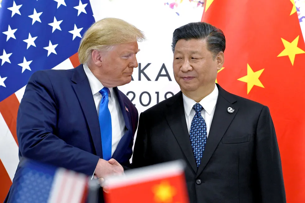 USAs president Donald Trump sammen med sin kinesiske motpart Xi Jinping i fjor sommer. Kina håper Trump taper valget, ifølge amerikansk etterretning.