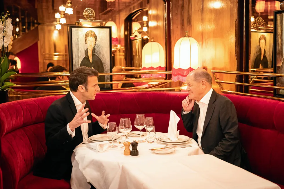 President Emmanuel Macron and Chancellor Olaf Scholz having dinner in Paris on Sunday.