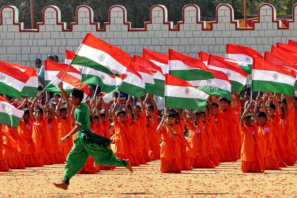 Greener: students wave Indian national flags