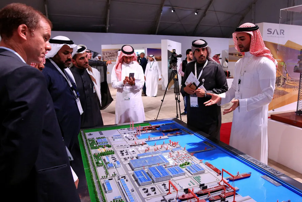 Coming to fruition: an engineers shows visitors a model of Saudi Aramco's maritime yard in Ras al Khair, Saudi Arabia, in November 2016