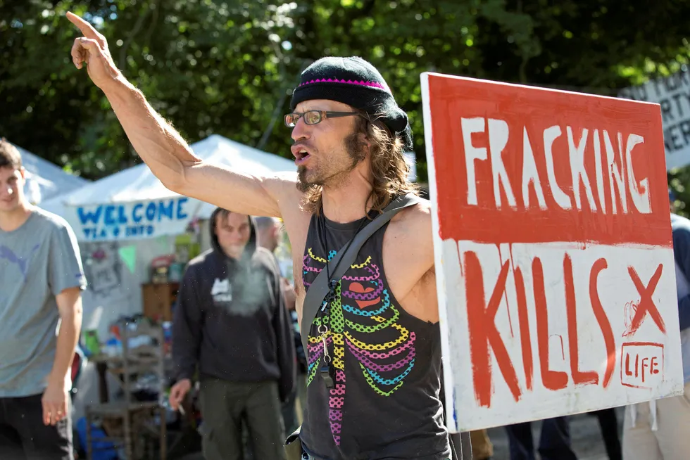 Winners: Fracking protesters outside the Cuadrilla drilling site in Balcombe