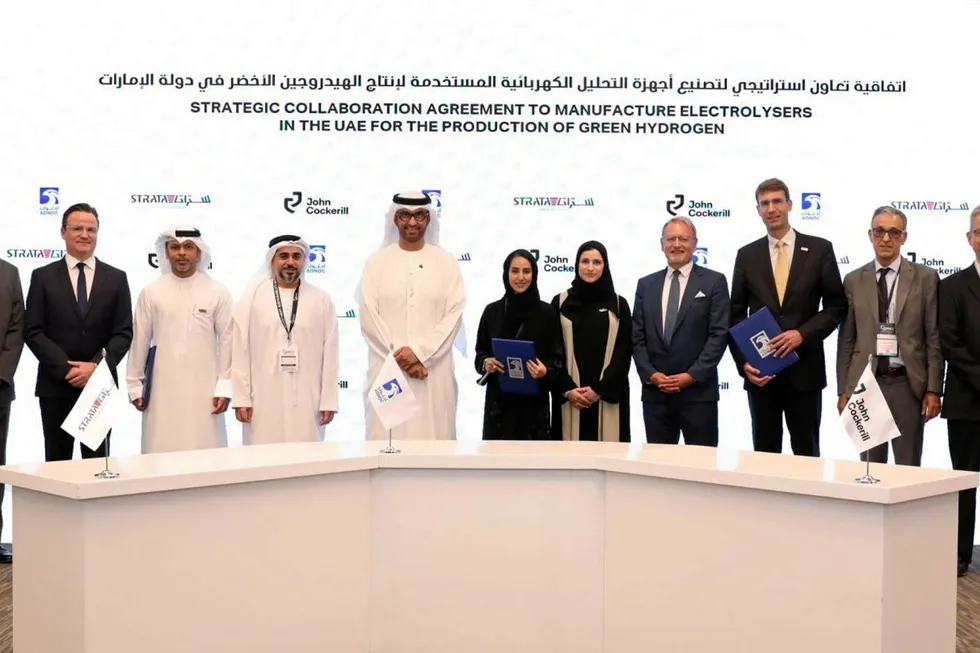 Signatories and attendees at the signing ceremony in Abu Dhabi on Wednesday, including Adnoc boss and COP28 president Sultan Ahmed Al Jaber (fifth from left), ADNOC New Energies senior vice-president Hanan Balalaa, centre, and John Cockerill Hydrogen CEO Raphaël Tilot (third from right).