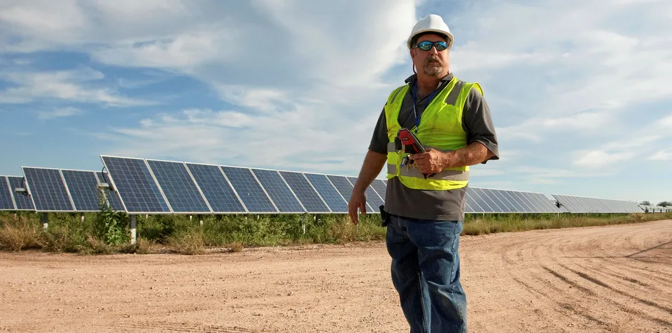 A worker at a solar farm in Texas.