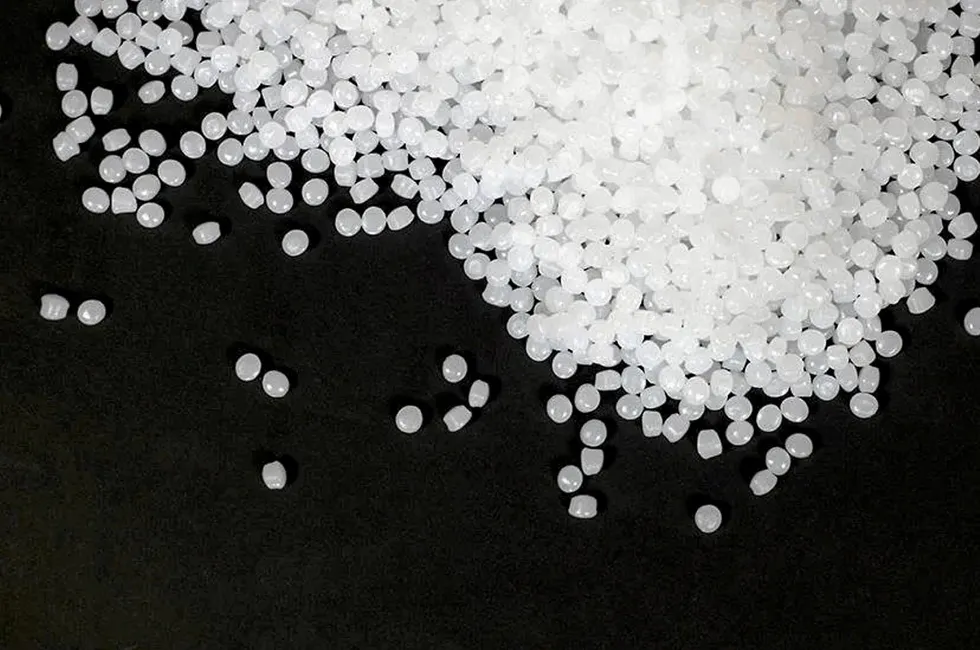 Pellets made of Teflon, a type of fluoropolymer.