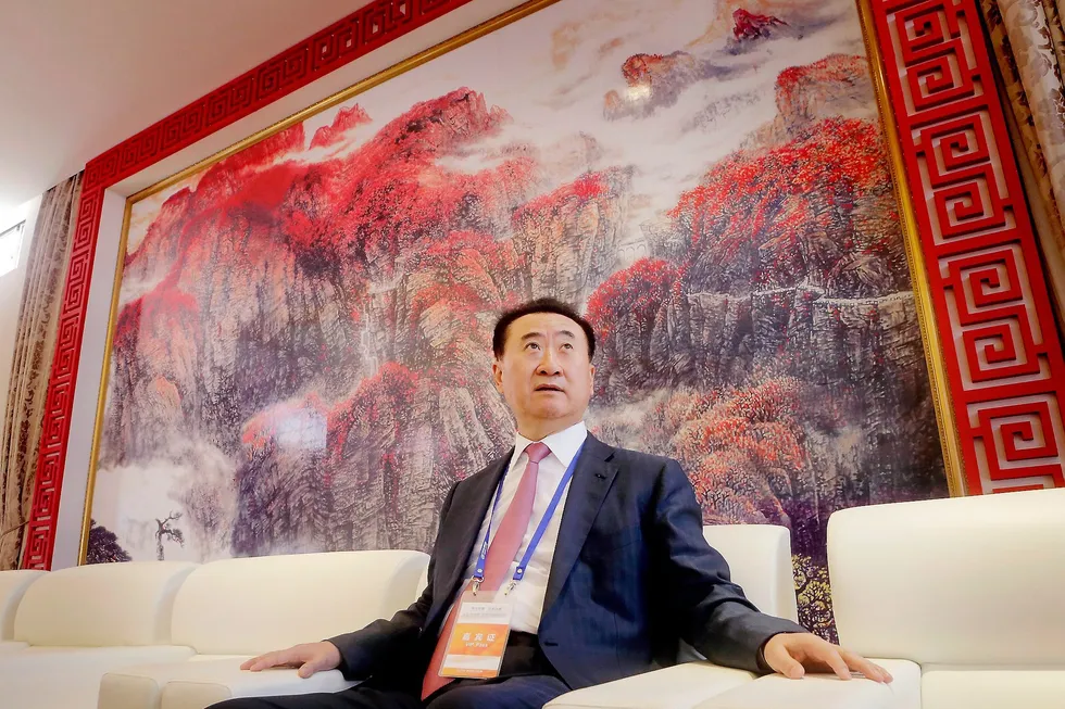 RIKEST. Wang Jianlin er Kinas rikeste person, og har bygd opp formuen fra eiendom. Mye tyder på at han nå vil være med å godkjenne forslag som kan ramme hans eget selskap. Foto: Jason Lee, Reuters/NTB Scanpix
