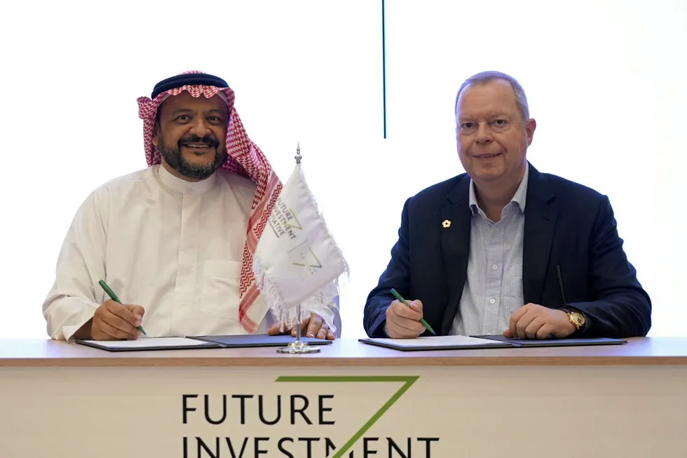 Aramco executive vice president of technology and innovation, Ahmad O. Al Khowaiter, left, and ENOWA CEO Peter Terium, right