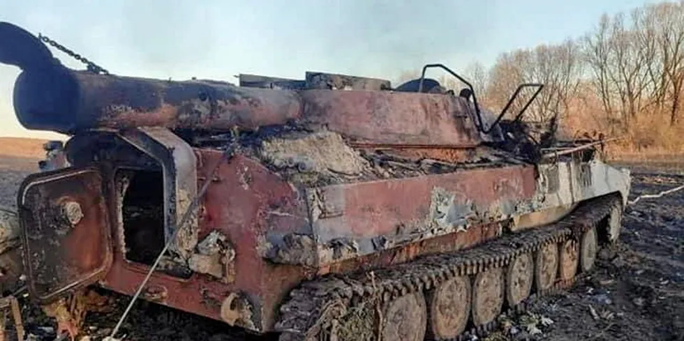 A Russian tank destroyed in a Ukrainian field in March 2022. The country's wheat production is under threat from the Russian invasion, pressuring costs for fish feed.