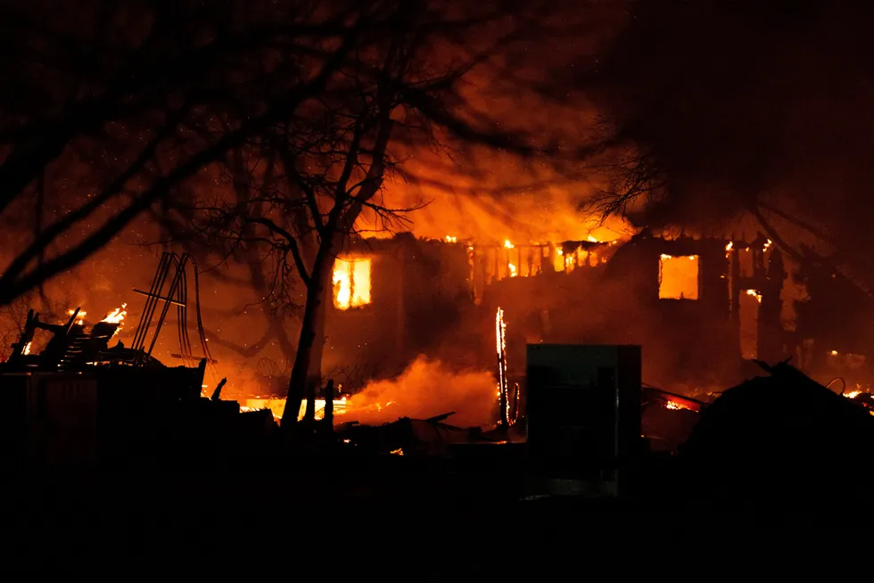 Destruction: A home in Louisville, Colorado, is engulfed by fire