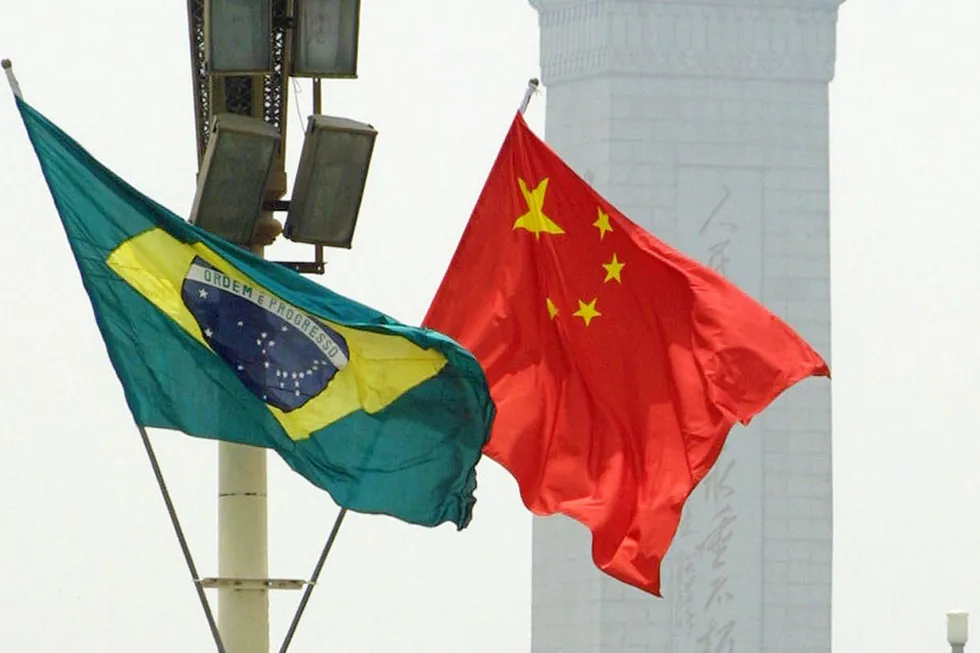 Progress made: (Brazil flag, left, and China flag.) Work has progressed in China for a floating production, storage and offloading vessel that is destined for deployment offshore Brazil.
