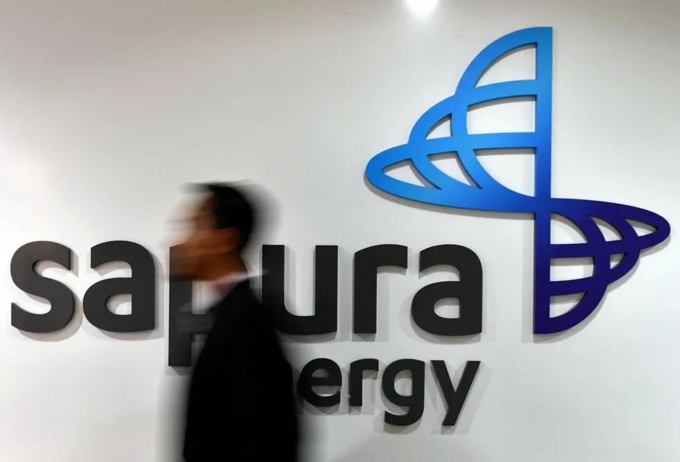 Headquarters: an employee walks past the Sapura Energy logo in Kuala Lumpur Malaysia in September 2018