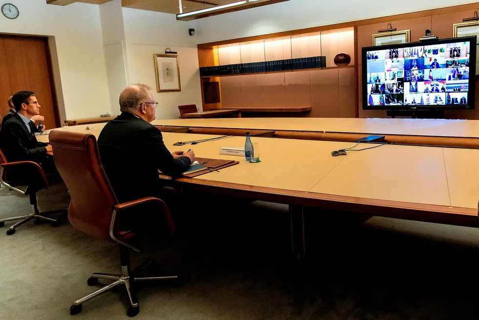Online summit: Australian Prime Minister Scott Morrison (C) attends a videoconference with G20 leaders to discuss the Covid-19 coronavirus