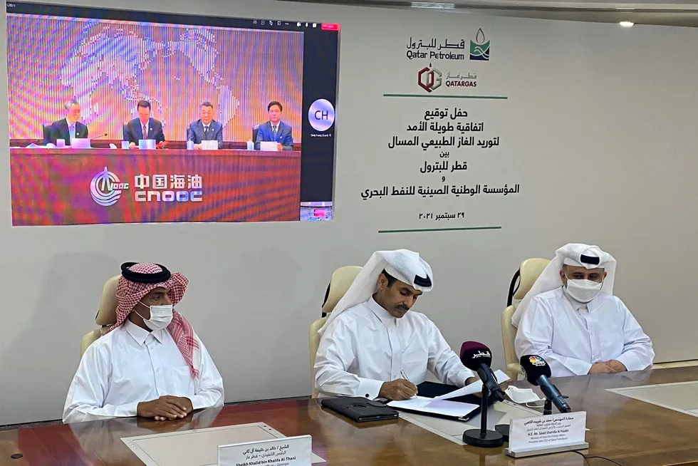 LNG deal: Qatar Petroleum chief executive Saad Sherida al-Kaabi signing a long term LNG supply deal with CNOOC