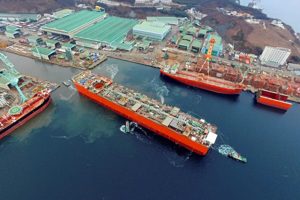 Launch: the hull of the Coral Sul FLNG vessel enters the water at Samsung's yard in Geoje, South Korea