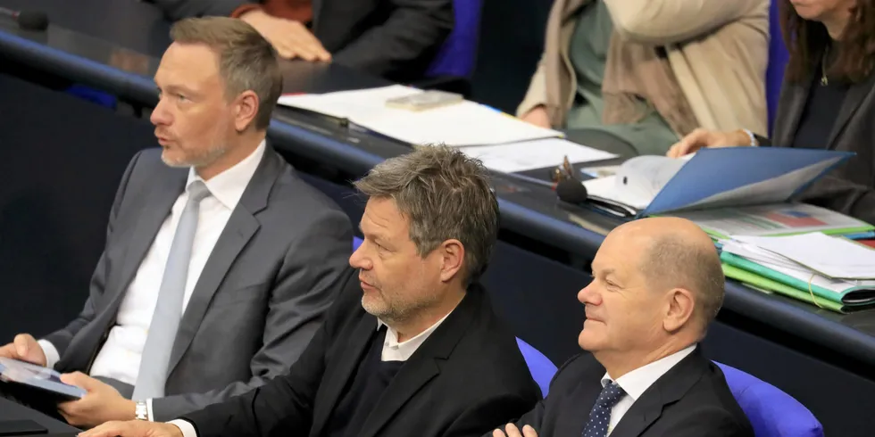 German Chancellor Olaf Scholz with his federal ministers Robert Habeck (centre) and Christian Lindner.