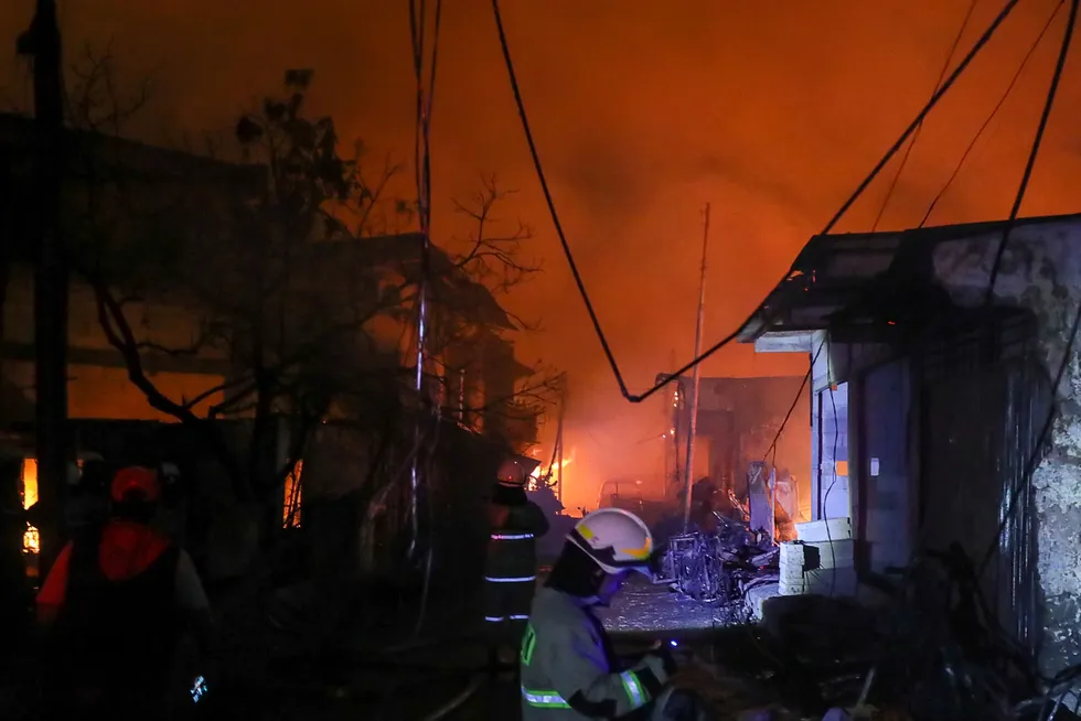 Ablaze: firefighters work to extinguish the fire in a residential area near Pertamina’s fuel depot in Plumpang, Jakarta, Indonesia.