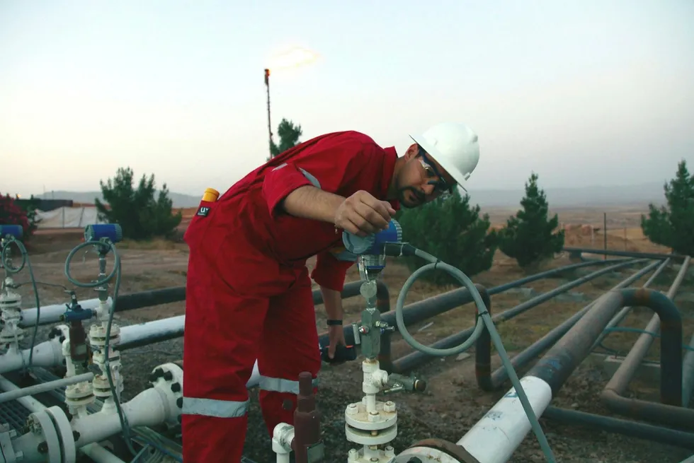Kurdish field: a worker at the Taq Taq oilfield