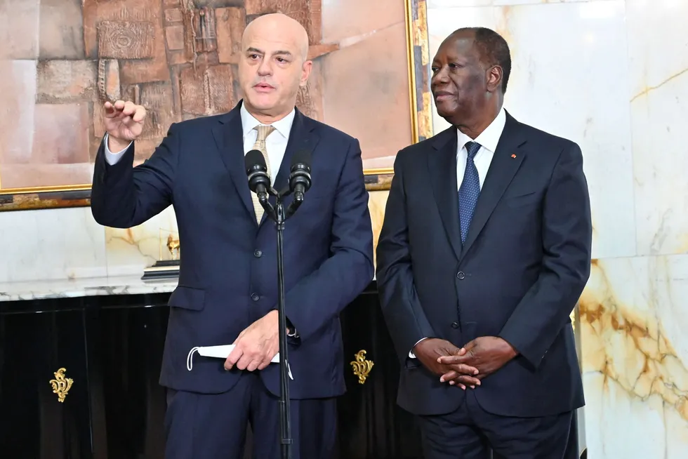 Visit: Ivorian President Alassane Ouattara (right) and Eni chief executive Claudio Descalzi addressed a press conference on 10 December at the presidential palace in Abidjan