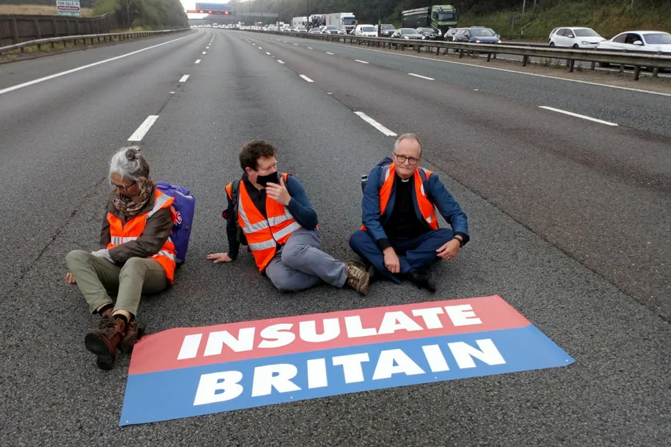 Sit down protest: activists on the M25 motorway