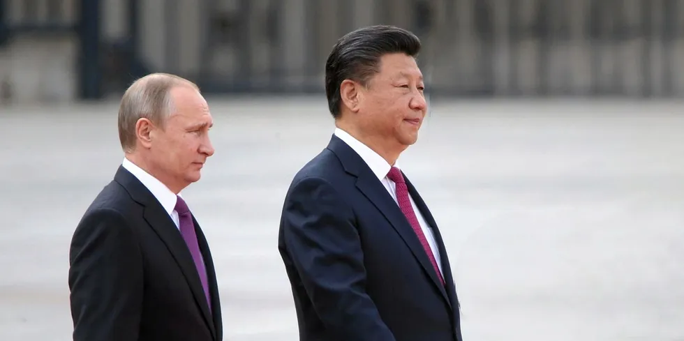 Russian President Vladimir Putin (L) and Chinese President Xi Jinping.