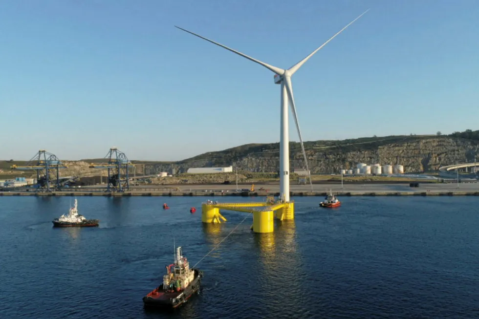 Floating wind: WindFloat Alantic's semi-submersible floating wind turbine seen leaving a Spanish yard en route to Portuguese waters