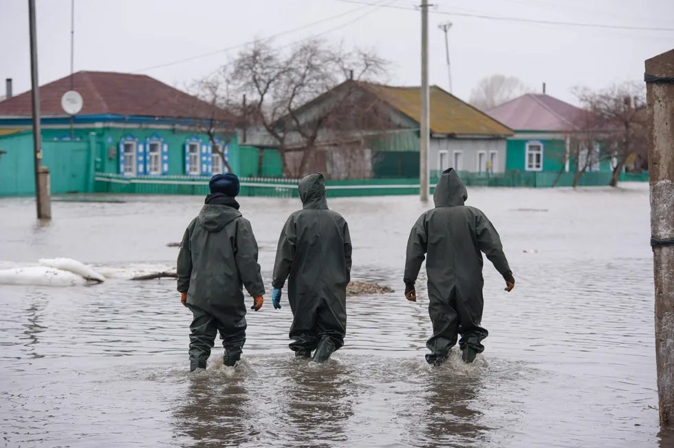 Kazakh rescuers evacuate residents of a flooded settlement in the country’s north. Kazkahstan’s oil and gas sector has provided funding, workers and equipment to help the country’s flood relief efforts.