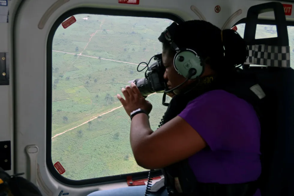 Eye in the sky: a Shell contractor takes pictures of the Trans-Niger Pipeline in Nigeria’s Niger delta to monitor oil theft and illegal refining.