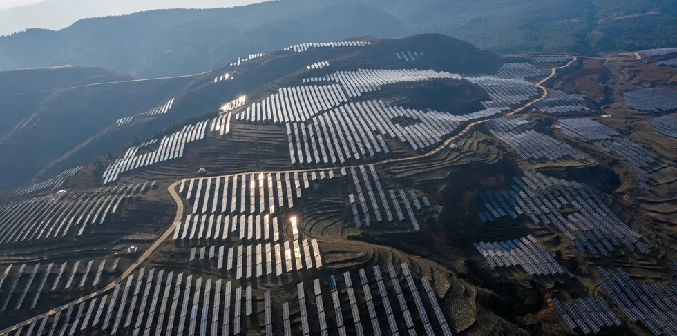 Aerial view of solar panels at a photovoltaic power station in Weining Yi, Hui, and Miao Autonomous County, Bijie City, Guizhou Province of China.