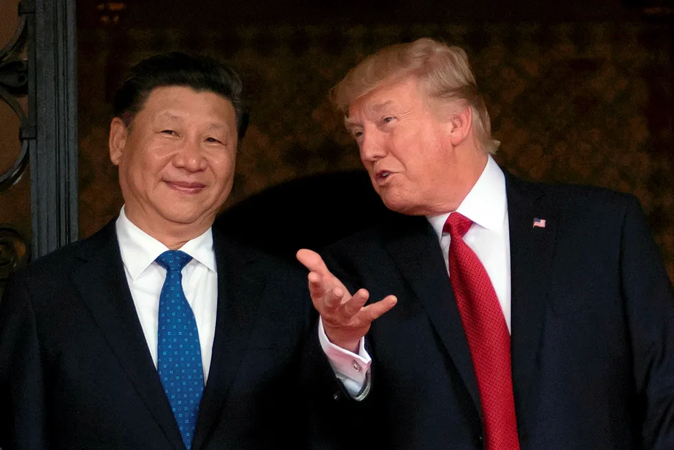 Visit: US President Donald Trump (right) welcomes Chinese President Xi Jinping (left) to the Mar-a-Lago estate in Florida last month.