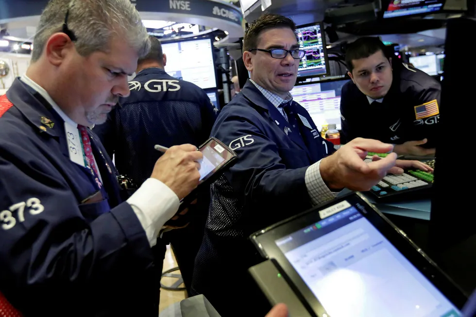 On the floor: traders at the New York Stock Exchange