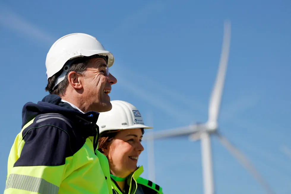 Wind energy: Dutch Prime Minster Mark Rutte and TenneT chief executive Manon van Beek stand in front of a turbine at de Maasvlakte in the Netherlands.
