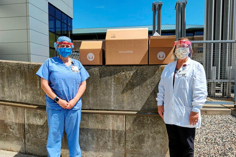 Protection: nurses Sara Simon (left) and Deborah Anderson (right) of Mercy Healthy with their new face shields donated by Herman Miller/Herman Miller Cares and Ineos