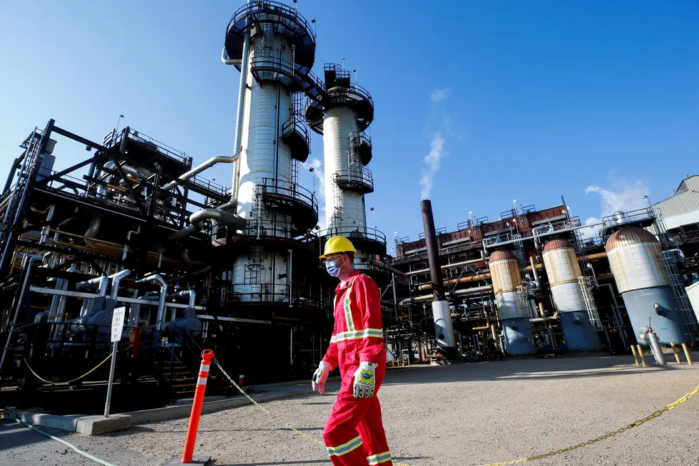 Flagship operation: a Shell employee walks past the company's Quest CCS facility in Alberta, Canada