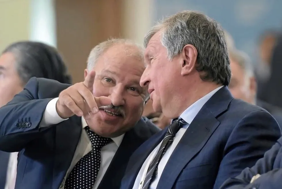 Mutual benefit: chairman of Russian oil producer Neftegazholding Eduard Khudaynatov, left, and Rosneft chief executive Igor Sechin