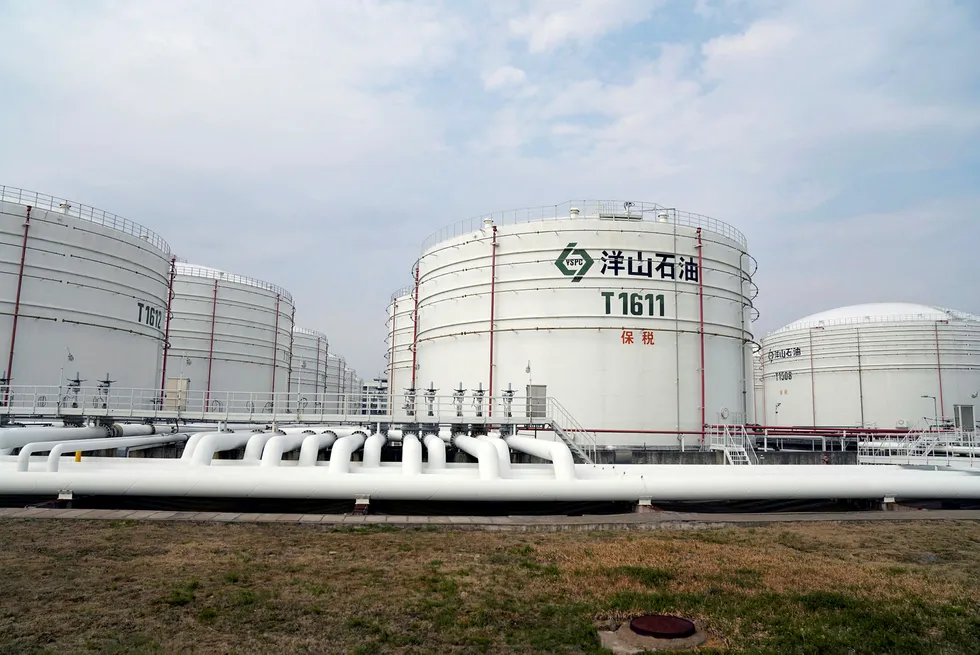 China reserves: oil tanks are seen at an oil warehouse at Yangshan port in Shanghai, China