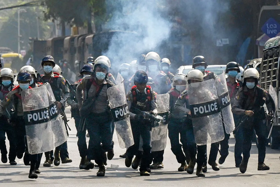 Tear gas: police attempt to disperse pro-democracy demonstrators in the commercial hub Yangon