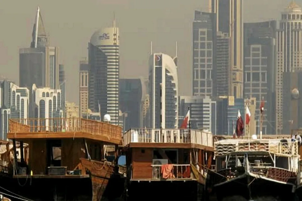 Middle East pressure: boats moored with the skyline of Qatar’s capital Doha in the background
