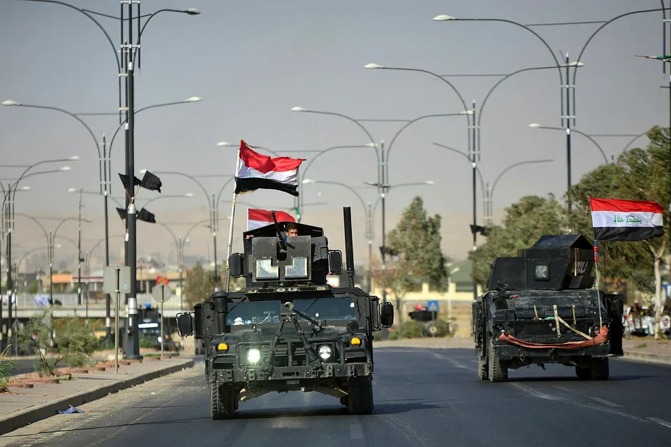 Irakiske militæret er nå sammen med føderalt politi eneste bevæpnede styrker igjen i Kirkuk. Foto: Stringer/Reuters/NTB scanpix