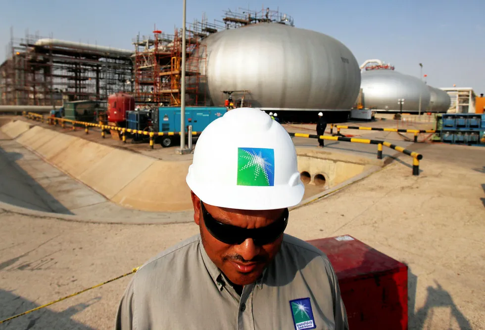 Output drive: an Aramco employee at an oil facility in Abqaiq