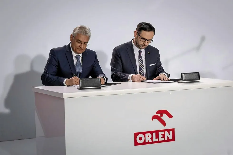 Downstream deal: Aramco's Mohammed Y Al Qahtani and PKN Orlen's Daniel Obajtek signing the refinery deal