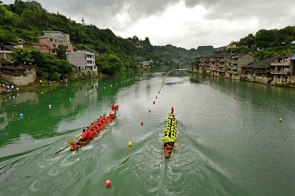 Race is on: teams competing during a dragon boat race in Huangping in Guizhou, China