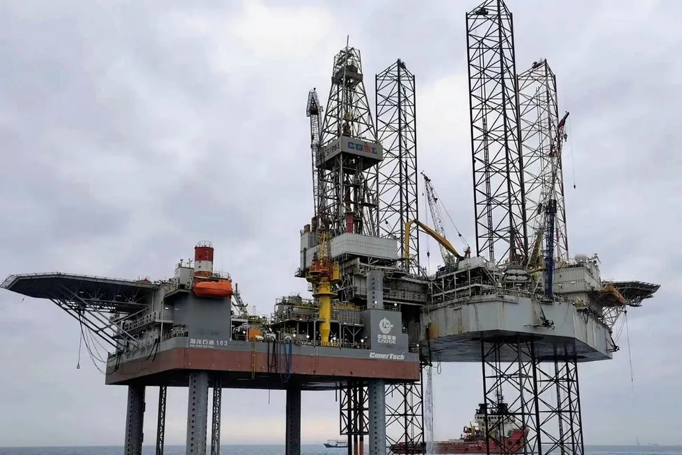 Development drilling: COSL’s jack-up rig Strike moored over the Weizhou 12-8E platform in China’s Beibu Gulf