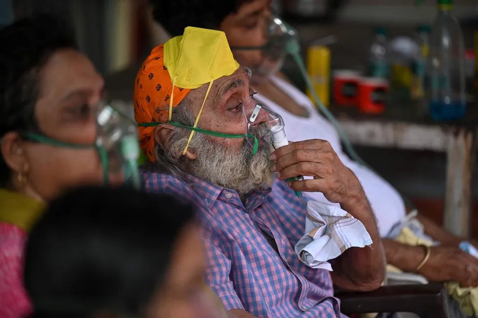 Deepening crisis: Covid-19 coronavirus patients breathe with the help of oxygen provided by a Gurdwara, a place of worship for Sikhs