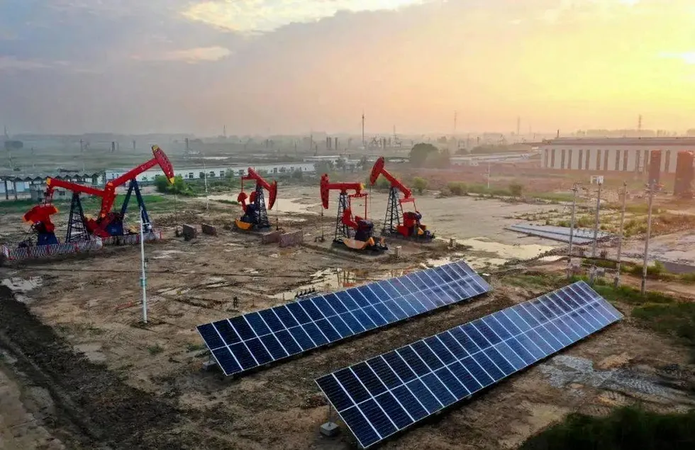 Old and new: a Sinopec photovoltaic plant sits alongside an oilfield
